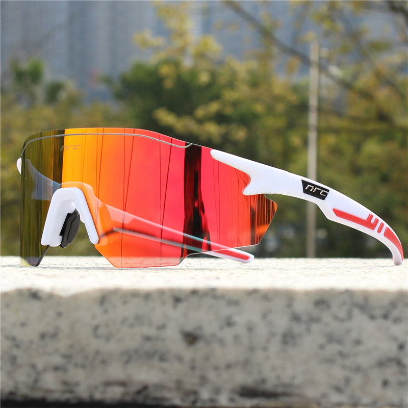 White polarized sports sunglasses with orange mirrored wrap lenses