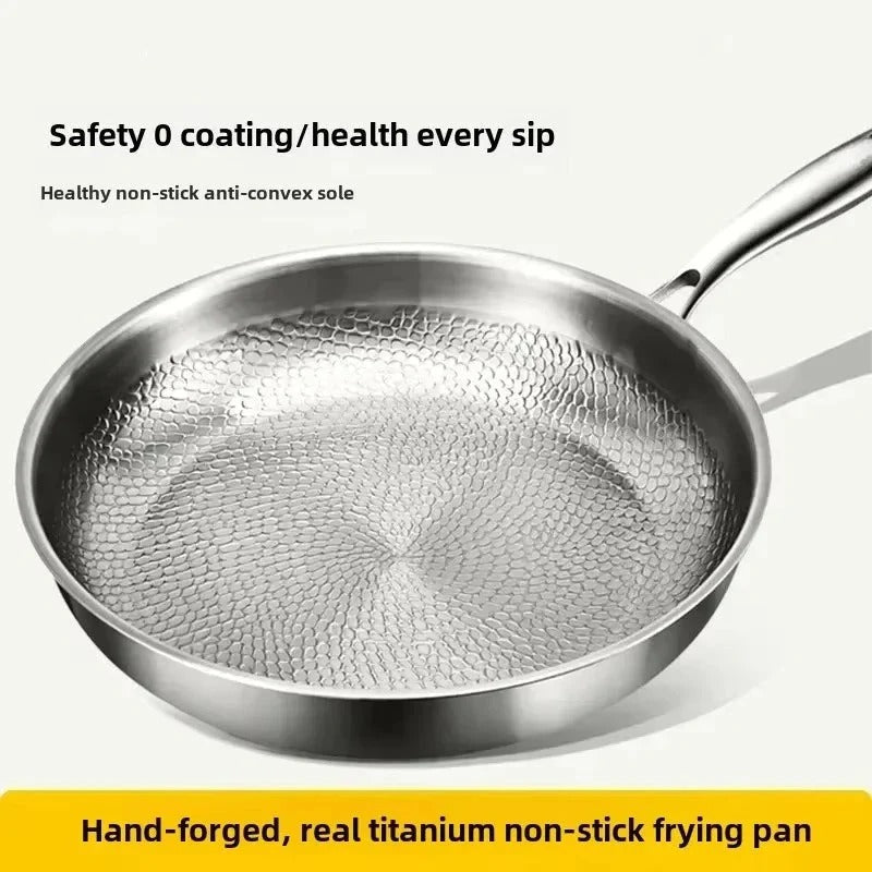 Hammered titanium frying pan with textured nonstick interior and long handle