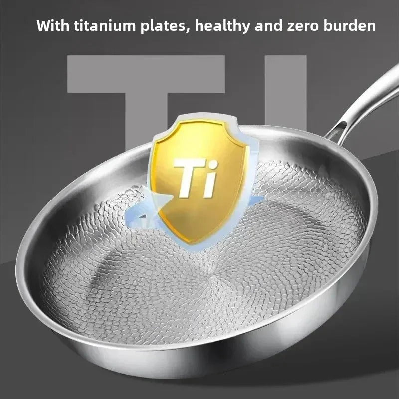 Hammered titanium frying pan interior with Ti emblem graphic and long handle