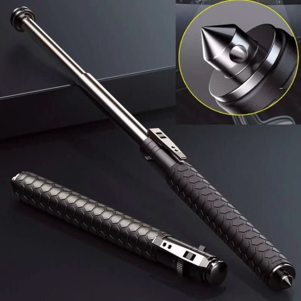 Black and silver baton with detailed design on a dark background