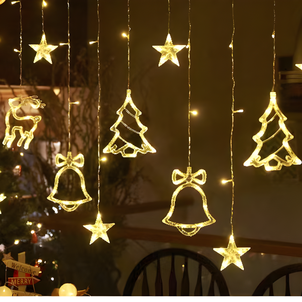Warm white LED holiday curtain lights with hanging reindeer, bells, and tree ornaments