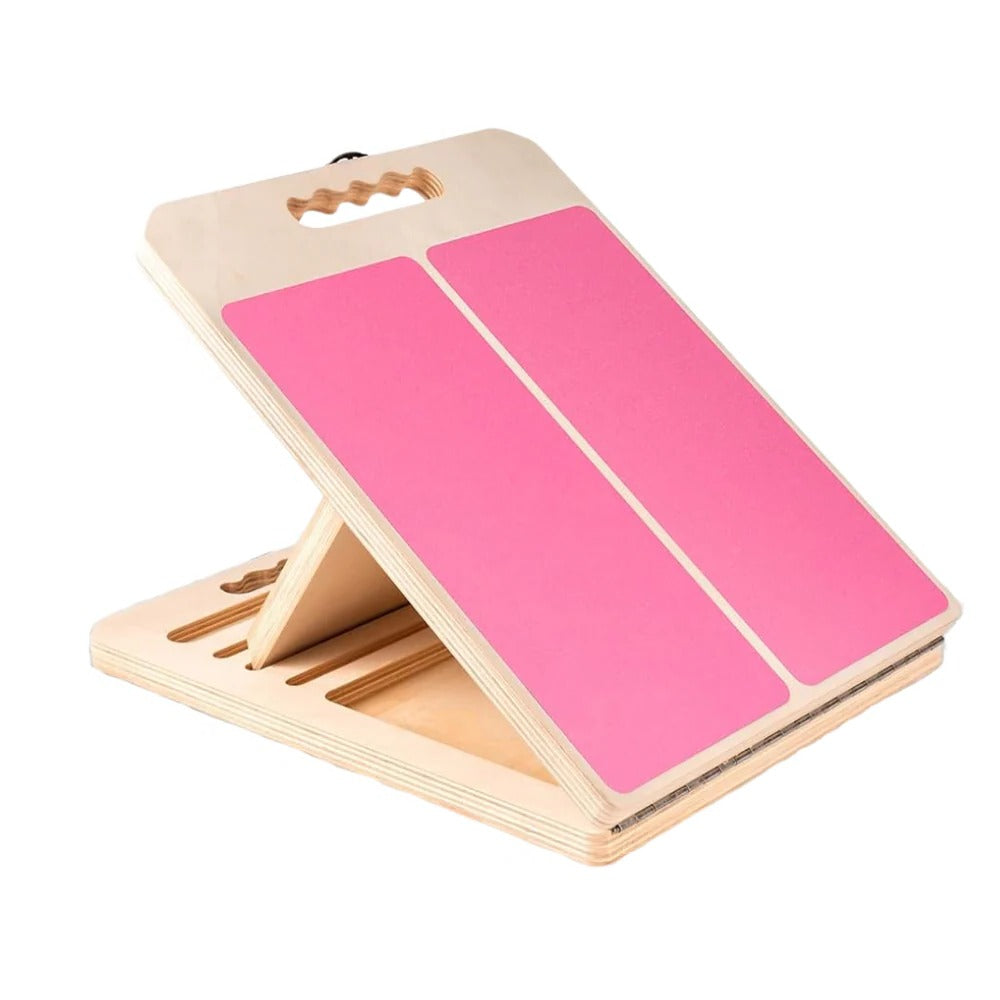 Wooden adjustable incline slant board with pink textured grip surfaces and upright wooden base
