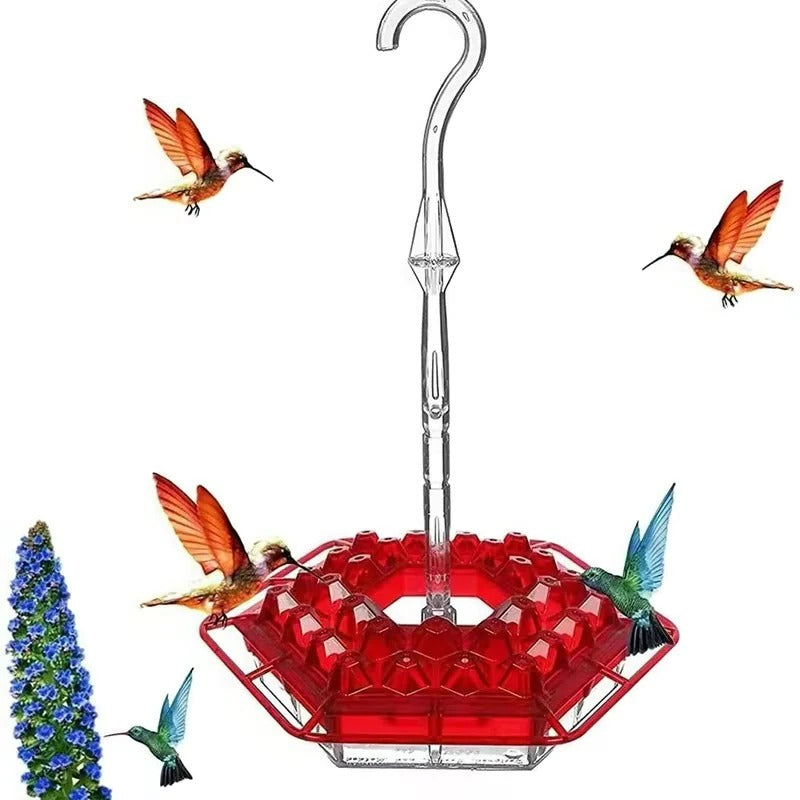 Red ant-proof hanging bird feeder with clear tube and hex tray, viewed from the front.