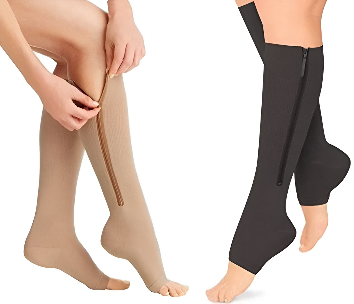 Beige and black compression support socks, side zippers shown on legs