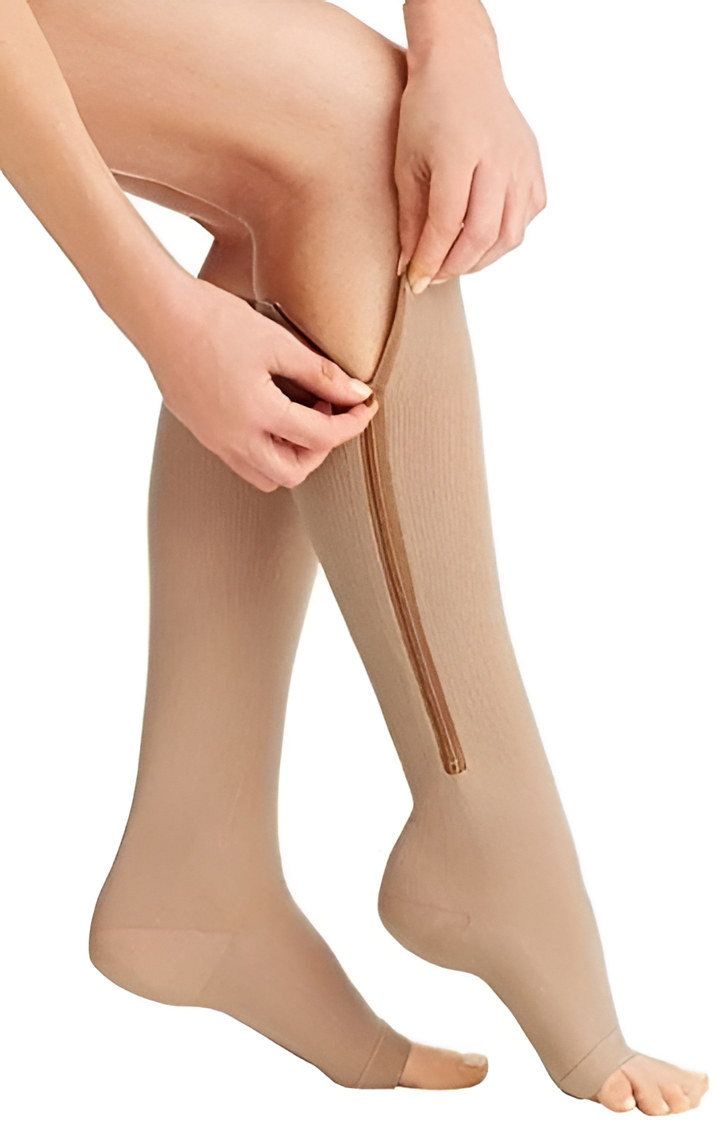 Beige compression support socks with side zipper, shown being opened by hands