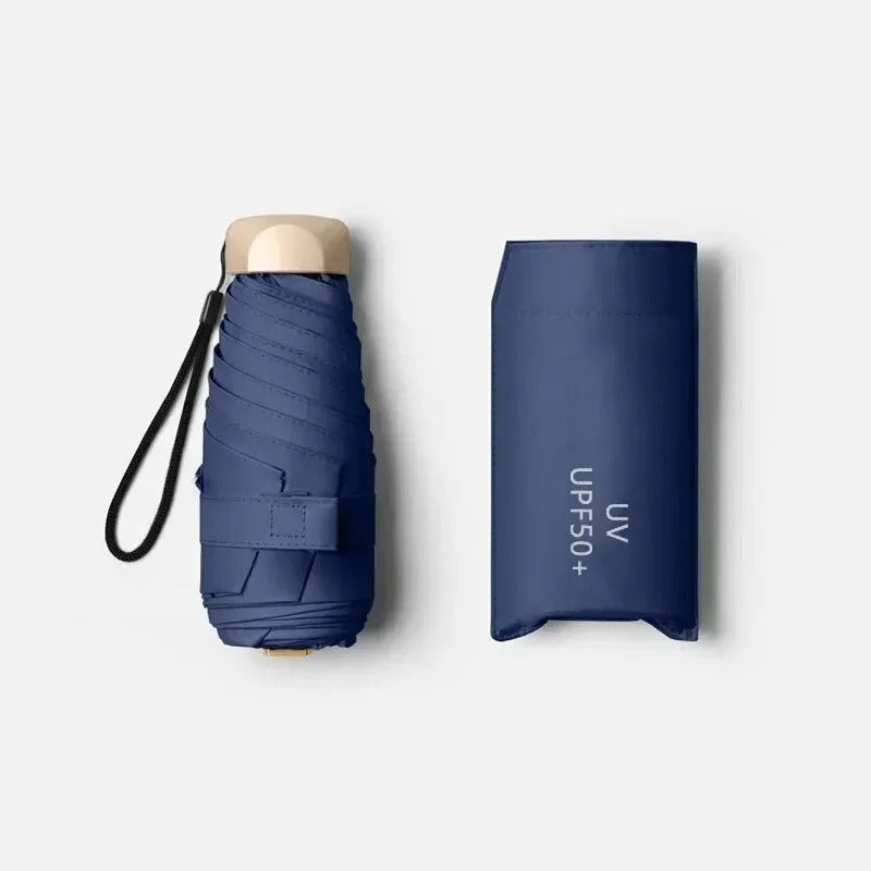 Navy blue compact foldable mini umbrella with wrist strap and protective cover