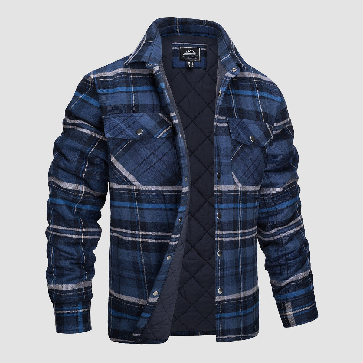 Blue plaid quilted shirt jacket with button front, collared neck, and flap chest pockets