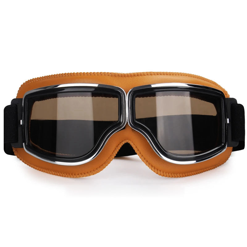Khaki motorcycle goggles with dark tinted mirrored lenses and over-glasses strap