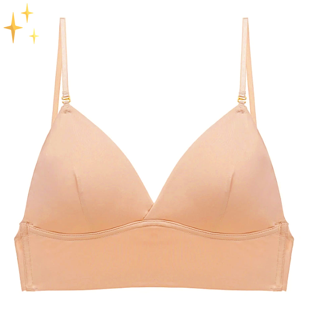 Beige seamless backless support bra with thin adjustable straps and low-cut front