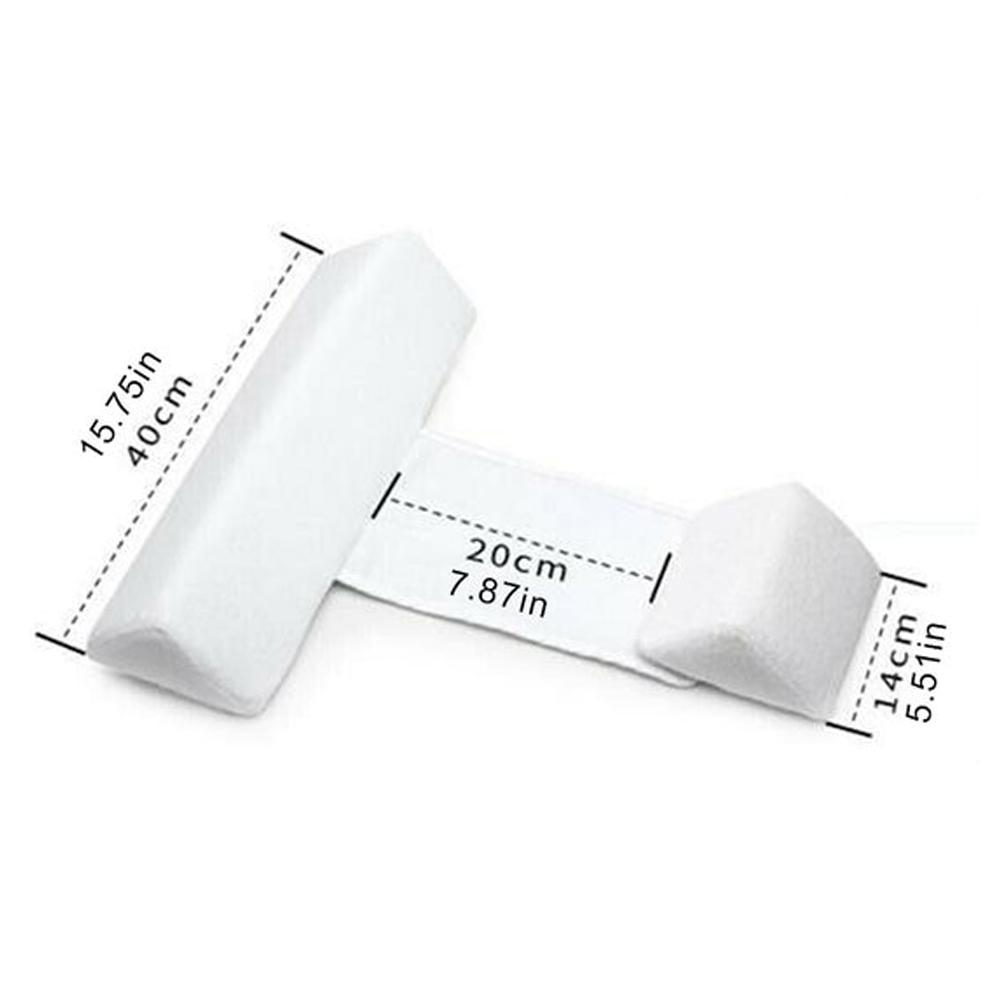 Adjustable baby side sleeper pillow with white wedge cushions and central adjustable band