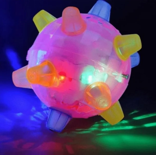 Pink LED jumping activity ball glowing with multicolor light and soft transparent spikes
