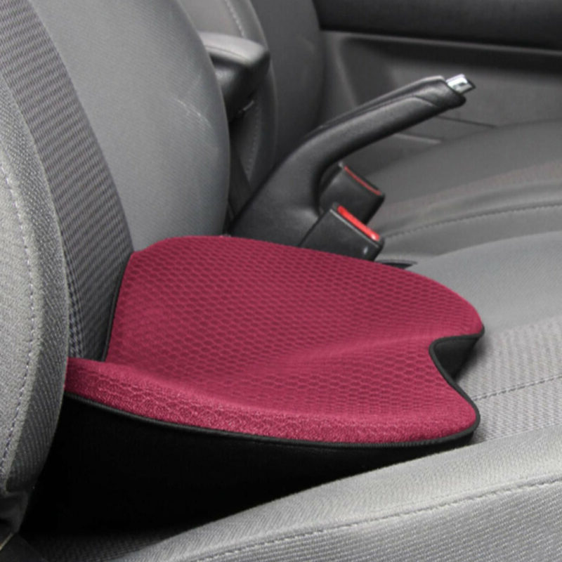 Red car seat cushion on a gray car seat