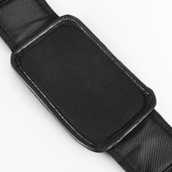 Black fabric strap with rectangular hook-and-loop patch and stitched edging