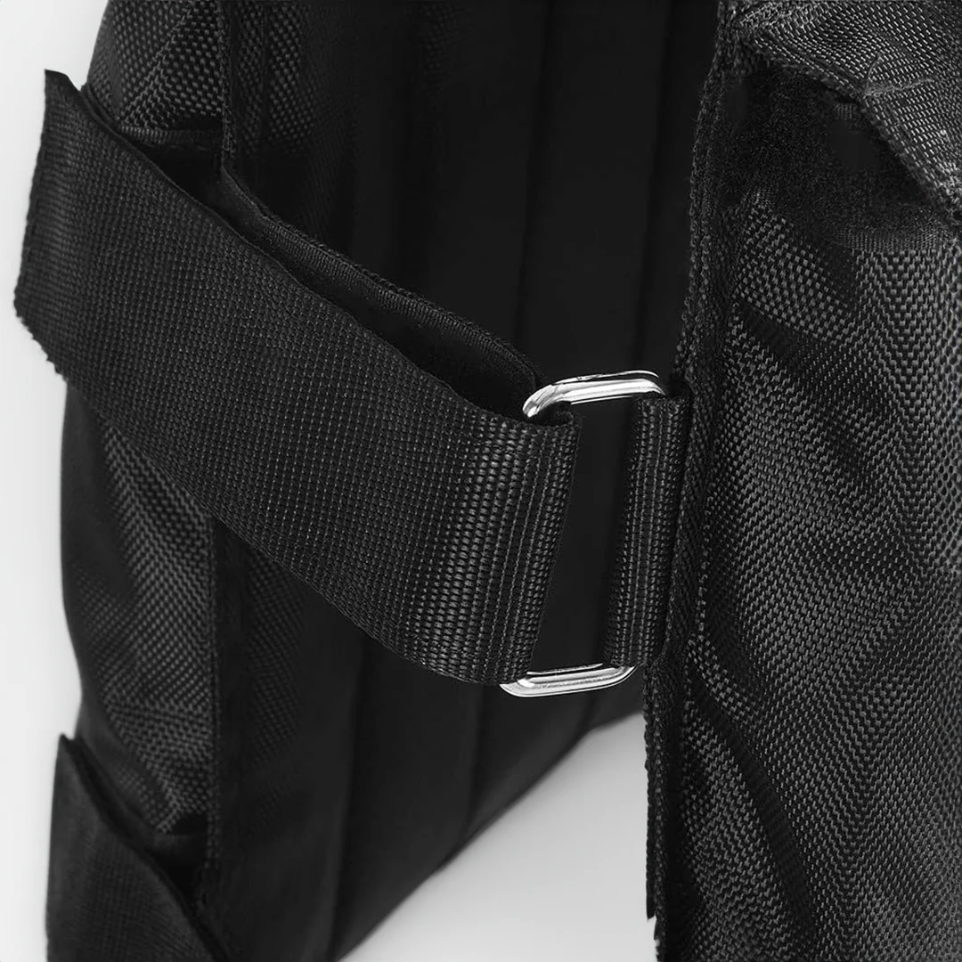 Black adjustable vest strap with metal buckle and textured fabric panel