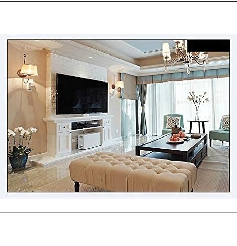 Mini wireless security camera live video frame showing a living room with TV and sofa