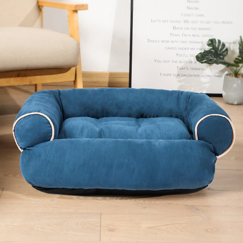 Blue egg-crate memory foam dog bed with curved bolster sides and supportive cushion