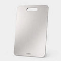 Titanium cutting board with handle slot, brushed silver finish