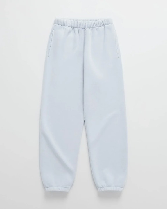 Light blue sweatpants with elastic waistband and tapered cuffs.