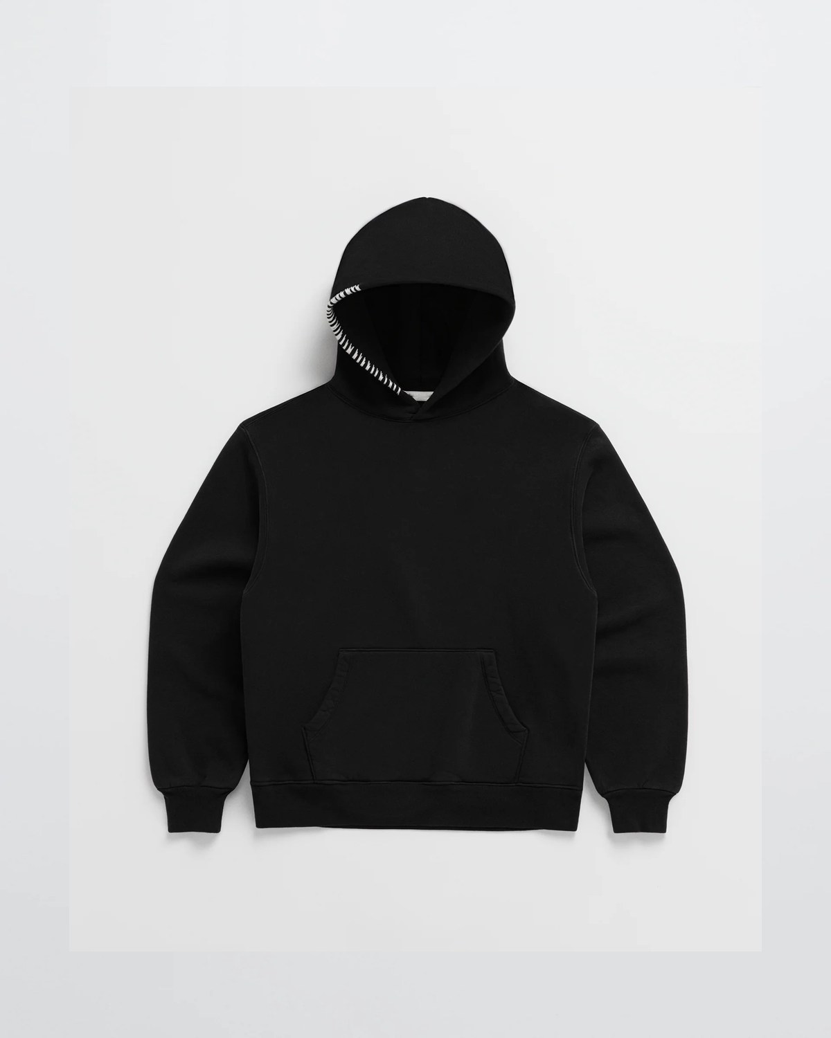 Black hoodie with kangaroo pocket and stitched hood opening.