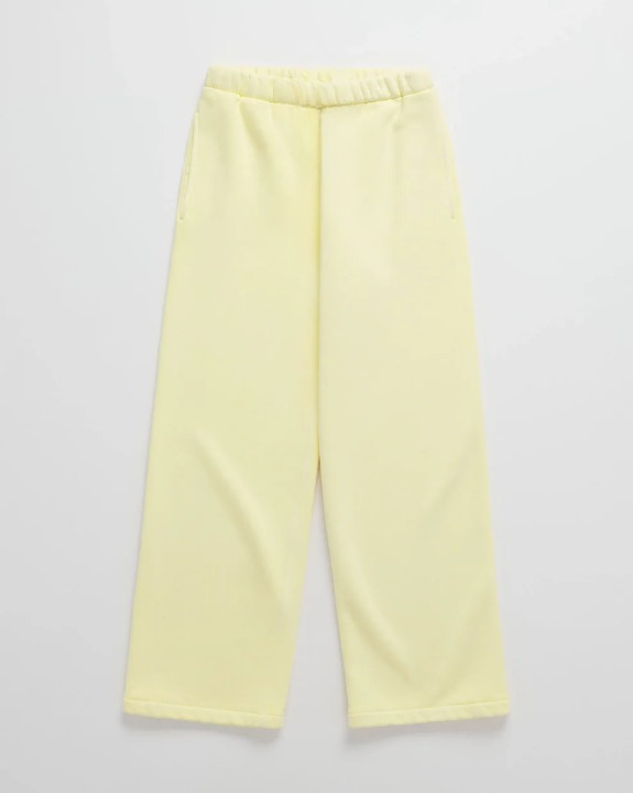 Yellow sweatpants with elastic waistband and tapered cuffs.
