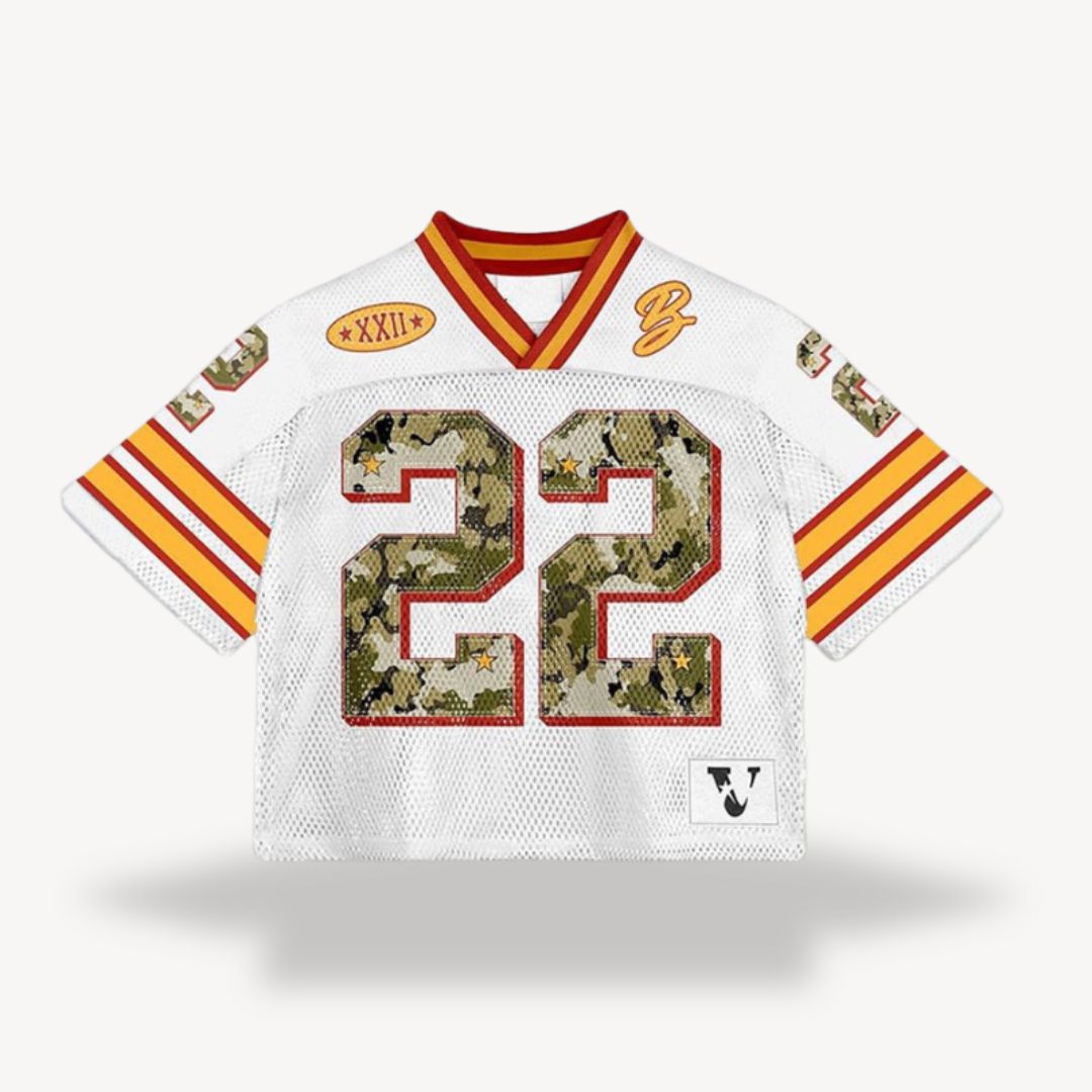 White V-neck short sleeve jersey shirt with camo-style large front numbers and orange trim