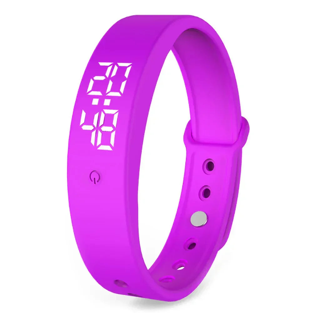 Purple waterproof vibration alarm watch with digital time display on silicone strap