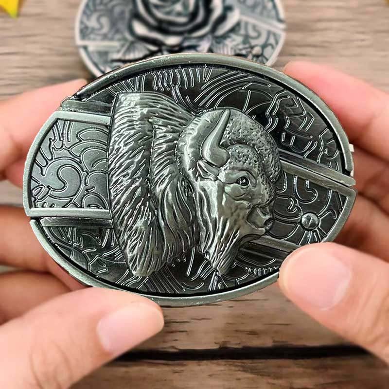 Western oval belt buckle with engraved ram head profile and textured detailing, silver-tone