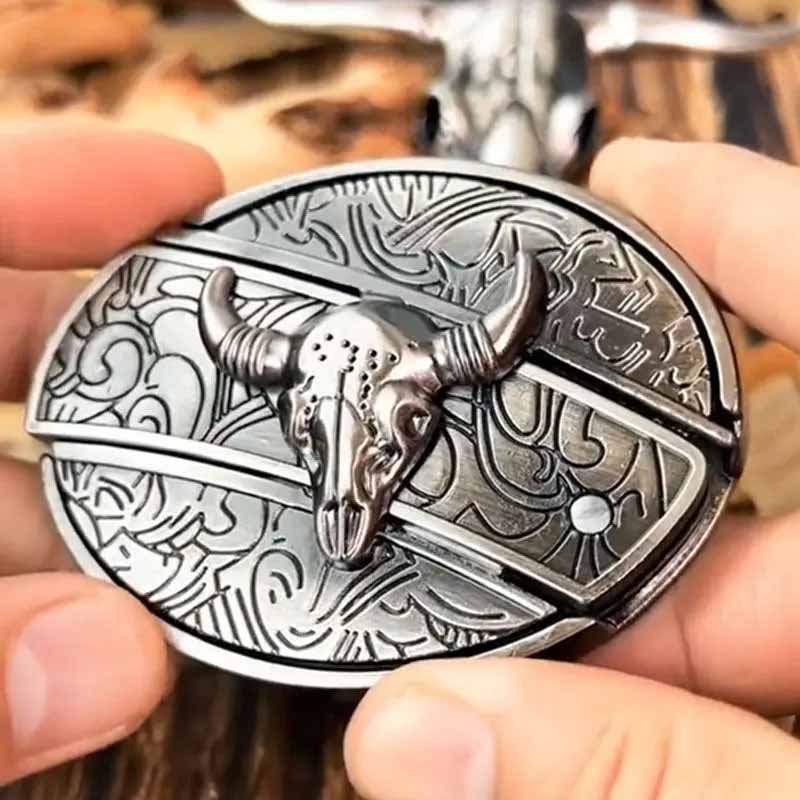 Western belt buckle with silver-toned bull skull engraving in an oval frame