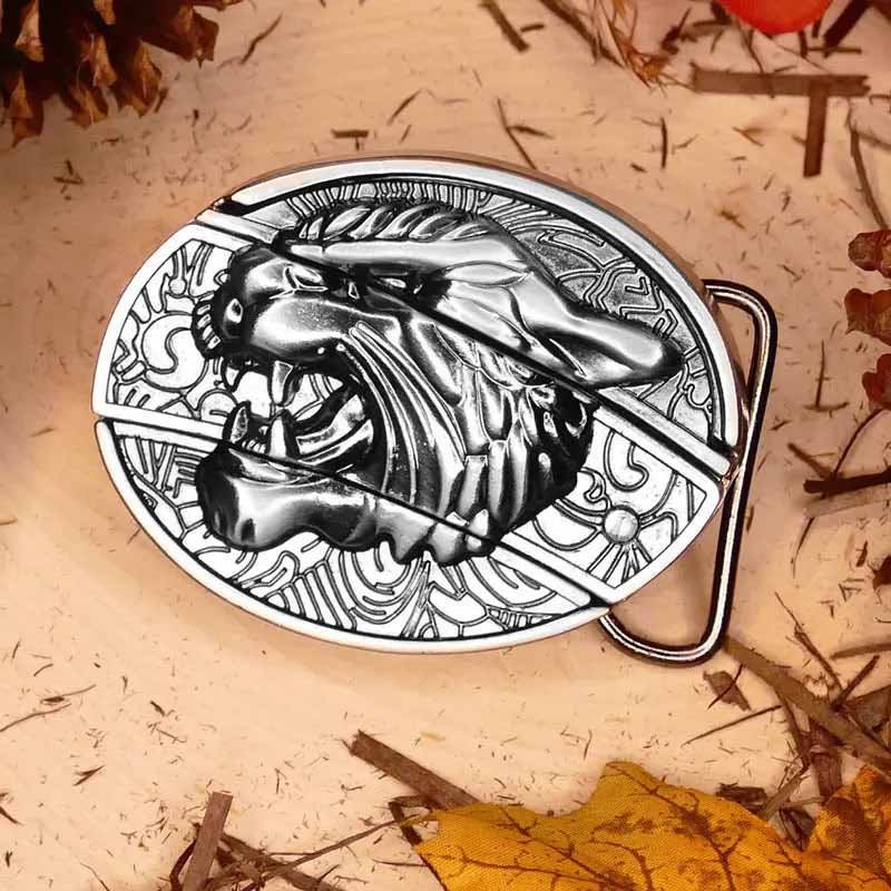Western belt buckle with bull skull relief in an oval with ornate etched border